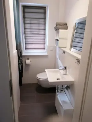 Ein Badezimmer in der Unterkunft Nahe Hängebrücke