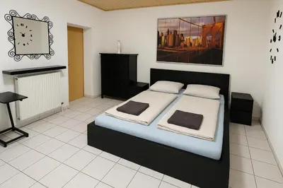 Ein Bett oder Betten in einem Zimmer der Unterkunft Unterkunft mit 2 separaten Zimmern