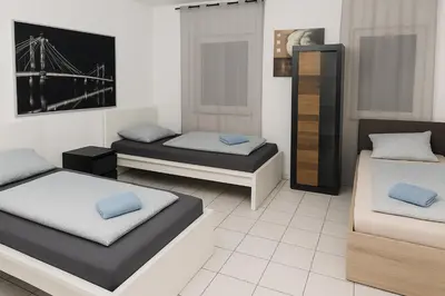 Ein Bett oder Betten in einem Zimmer der Unterkunft Unterkunft mit 2 separaten Zimmern