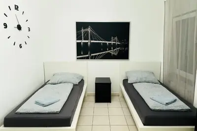 Ein Bett oder Betten in einem Zimmer der Unterkunft Unterkunft mit 2 separaten Zimmern