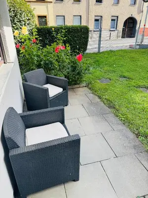 Ein Garten an der Unterkunft Helle 2-Zimmer Erdgeschosswohnung mit Terrasse