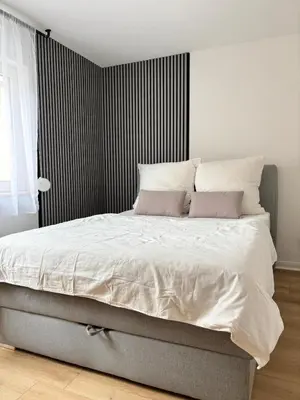 Ein Bett oder Betten in einem Zimmer der Unterkunft Zimmer Enjoy