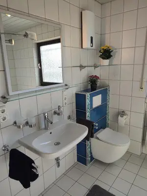 Ein Badezimmer in der Unterkunft Rheinuferhaus