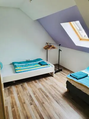Ein Bett oder Betten in einem Zimmer der Unterkunft BB Crew House