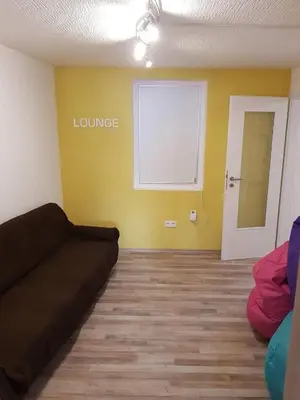 Ein Sitzbereich in der Unterkunft BB Crew House