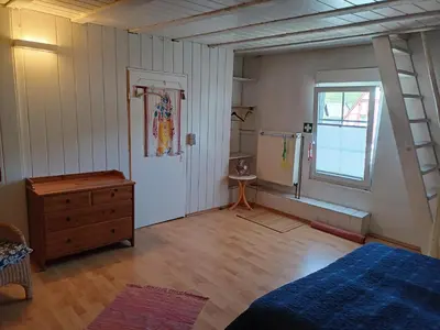 Ein Bett oder Betten in einem Zimmer der Unterkunft Welcome Moselhaus
