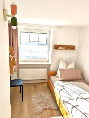 Ein Bett oder Betten in einem Zimmer der Unterkunft Auszeit zwischen Mosel und Nürburgring