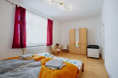 Ein Bett oder Betten in einem Zimmer der Unterkunft Große Altbauwohnung in Boppard für 7 Gäste