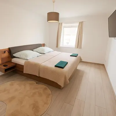 Ein Bett oder Betten in einem Zimmer der Unterkunft Koblenz Exclusive Residence