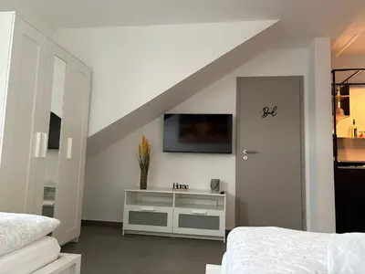 Ein Bett oder Betten in einem Zimmer der Unterkunft FeWo Mitte
