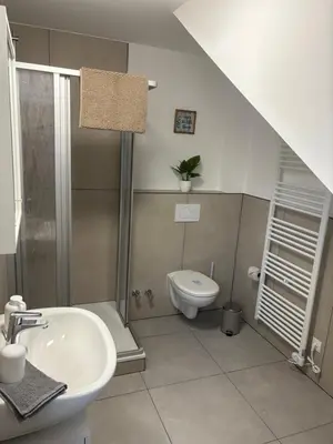 Ein Badezimmer in der Unterkunft FeWo Mitte