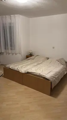 Ein Bett oder Betten in einem Zimmer der Unterkunft Ferienwohnung Trier