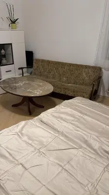 Ein Bett oder Betten in einem Zimmer der Unterkunft Ferienwohnung Trier