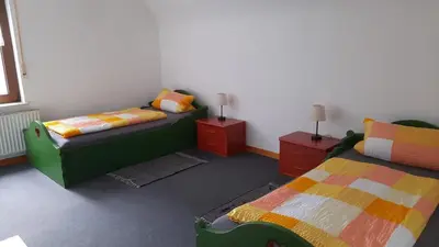 Ein Bett oder Betten in einem Zimmer der Unterkunft Ferienhaus Feyen