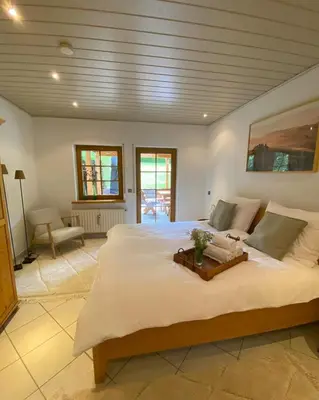 Ein Bett oder Betten in einem Zimmer der Unterkunft Auszeit Ferienhaus Nr 2a