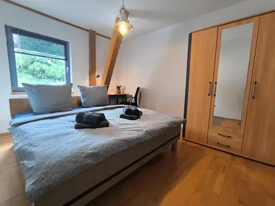 Ein Bett oder Betten in einem Zimmer der Unterkunft Ferienwohnung Vulkanblick -Dein Ruheplatz mitten im Vulkanland