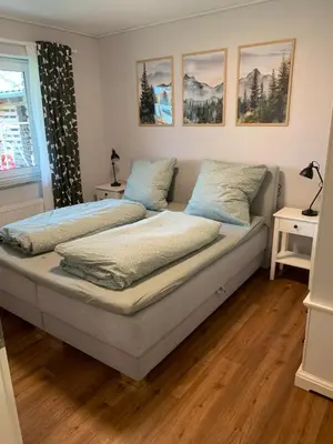 Ein Bett oder Betten in einem Zimmer der Unterkunft Ferienwohnung Unterm Nastberg