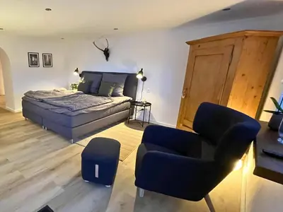 Ein Bett oder Betten in einem Zimmer der Unterkunft Apartment Eifelglück with roof terrace