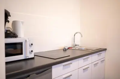 Küche/Küchenzeile in der Unterkunft Modernes Studio Koblenz mit Küche, WLAN & Gemeinschaftsbad