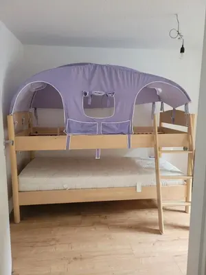 Ein Bett oder Betten in einem Zimmer der Unterkunft Ferienhaus Klara