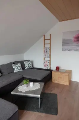 Ein Sitzbereich in der Unterkunft FeWo Luna - Wohnen am Tor zum Nationalpark Hunsrück-Hochwald