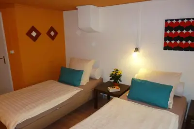 Ein Bett oder Betten in einem Zimmer der Unterkunft Haus des Handwerkers