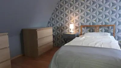 Ein Bett oder Betten in einem Zimmer der Unterkunft Haus des Handwerkers