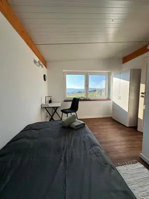 Ein Bett oder Betten in einem Zimmer der Unterkunft Monteurzimmer in Plaidt 6 Personen mit 4 Schlafzimmer