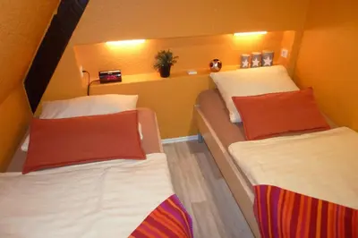 Ein Bett oder Betten in einem Zimmer der Unterkunft Ferienwohnung Rheinblick Koblenz