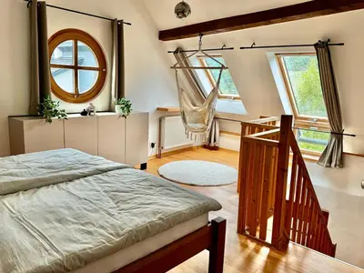 Ein Bett oder Betten in einem Zimmer der Unterkunft Garden Eden & Sauna