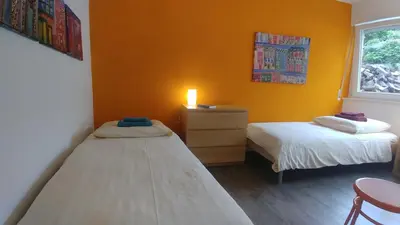 Ein Bett oder Betten in einem Zimmer der Unterkunft Gästehaus Koblenz