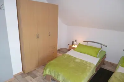 Ein Bett oder Betten in einem Zimmer der Unterkunft Ferienwohnung Uni Koblenz