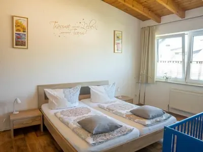 Ein Bett oder Betten in einem Zimmer der Unterkunft Niedersburger Eck
