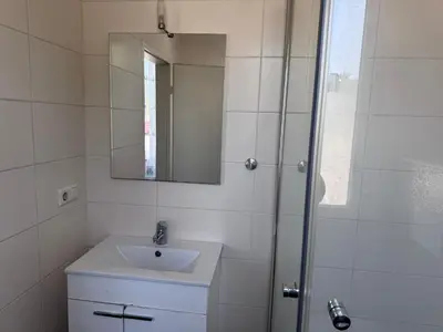 Ein Badezimmer in der Unterkunft DanMa Ferienwohnung Apartment-Gemeinschaftsküche