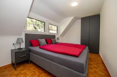 Ein Bett oder Betten in einem Zimmer der Unterkunft Ferienwohnung Merllorca DG