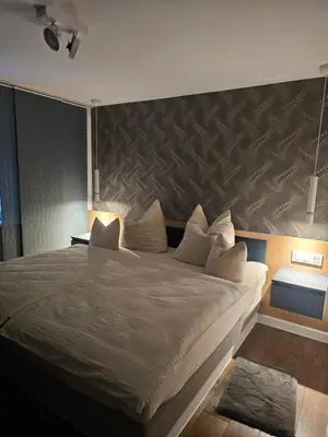 Ein Bett oder Betten in einem Zimmer der Unterkunft Costyn Apartments 1