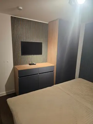 Ein Bett oder Betten in einem Zimmer der Unterkunft Costyn Apartments 1