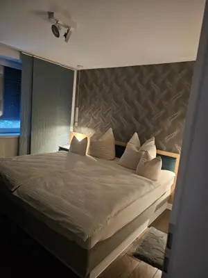 Ein Bett oder Betten in einem Zimmer der Unterkunft Costyn Apartments 1