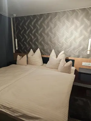 Ein Bett oder Betten in einem Zimmer der Unterkunft Costyn Apartments 1