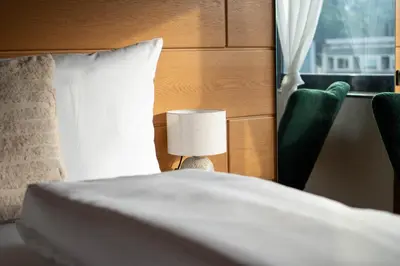 Ein Bett oder Betten in einem Zimmer der Unterkunft City Wohnung am Hbf mit 2 Schlafzimmern und Sky