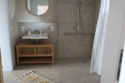 Ein Badezimmer in der Unterkunft KaiserLogen Living