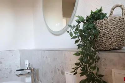 Ein Badezimmer in der Unterkunft KaiserLogen Living