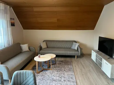 Ein Sitzbereich in der Unterkunft Ferienwohnung Anna Gerolstein