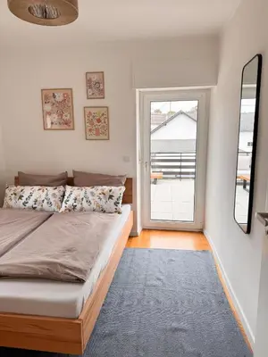 Ein Bett oder Betten in einem Zimmer der Unterkunft TRIMOSA - Apartments & Homes