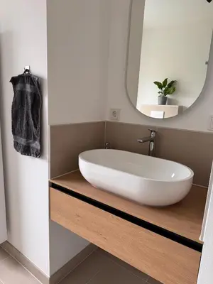 Ein Badezimmer in der Unterkunft TRIMOSA - Apartments & Homes