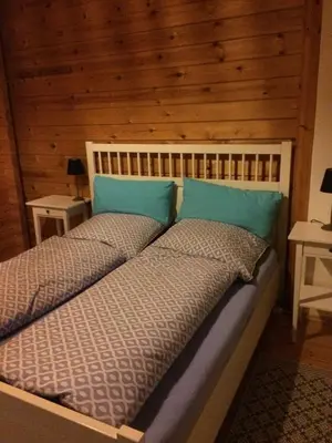 Ein Bett oder Betten in einem Zimmer der Unterkunft Ferienhaus Vulkaneifel Bei Hepp