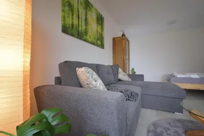 Ein Sitzbereich in der Unterkunft Ferienwohnung Familie Müller