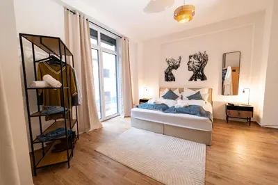 Ein Bett oder Betten in einem Zimmer der Unterkunft SALUS Living - Loft-Infrarotsauna-ruhiger Innenhof-Innenstadt