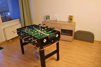 Eine Spielezimmer in der Unterkunft Rheintalblick Wohnen über den Dächern von Bingen
