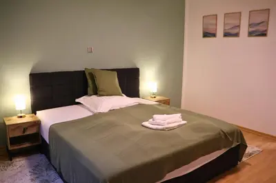 Ein Bett oder Betten in einem Zimmer der Unterkunft Rheintalblick Wohnen über den Dächern von Bingen
